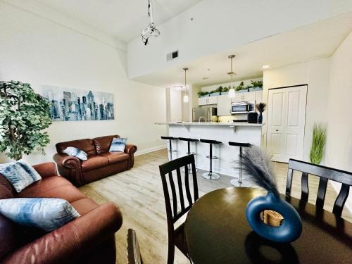 Mile Square Apartment | Two Bedroom Game Day Suite with 100 Projector TV