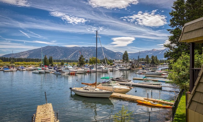 Tahoe Keys Condo | Two-story lakefront condo with access to dock, hot tub, pool & tennis