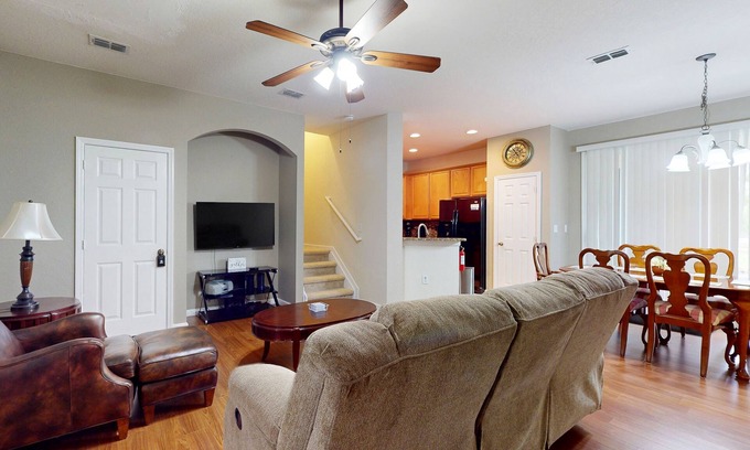 Trafalgar Village House | Updated retreat with pool access, W/D, AC, & patio - close to Disney Parks