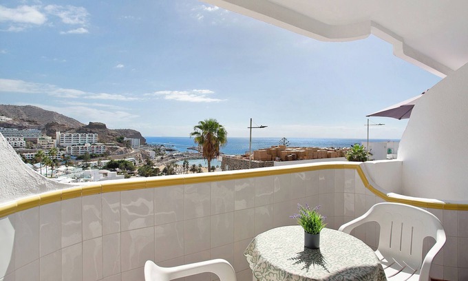 Puerto Rico Apartment | Vacation Apartment 'Appartamento Timo' with Sea View, Shared Pool and Wi-Fi