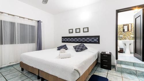 Colonia Adolfo Lopez Mateos Apartment | Vacation Rental - Upper Floor Room at Casa Cocoa