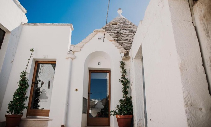 The Trulli of Alberobello House | VENTITRÈ- House of Apulia Mea