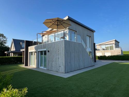 Kamperland House | Villa Maroma Mistral luxueus verblijf voor zakelijk en privé met gratis 4 E-bikes