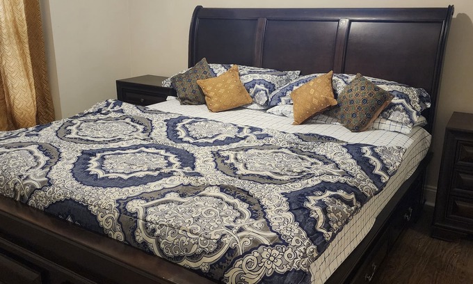 Triangle House | Walk in sunny furnished basement with 2 bedrooms and 2 bathrooms