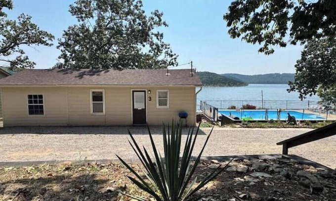 Boulder Point Cabin | Waterfront Getaway w/Pool + Dock. Pet-Friendly!