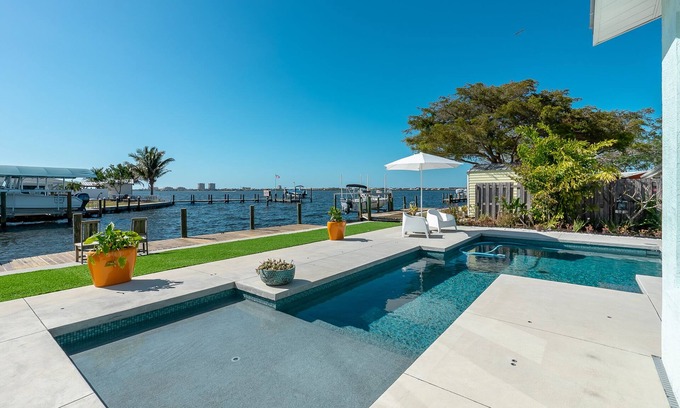 Bradenton House | Waterfront Home! Sleeps 8 Heated Pool Spa Boat Dock Chef Kitchen Small dogs OK