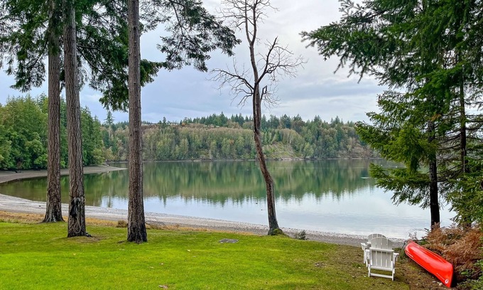 Shelton House | Waterfront home with private hot tub, patio, games, & gym room