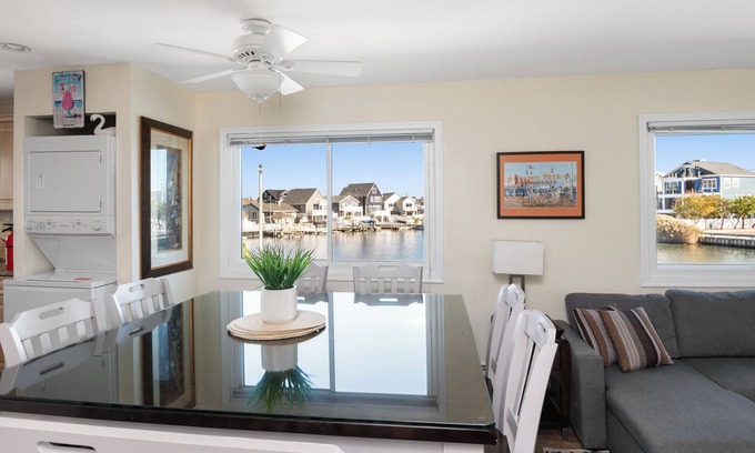 Seaside Heights Villa | Waterfront private XL 2ndFL Sky Villa w fenced yard + Jacuzzi Dock Kayaks Arcade