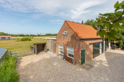 Koudekerke Apartment | Welcome in - Vakantiewoning Jikkemien met terras, vrij uitzicht en huisdiervriendelijk