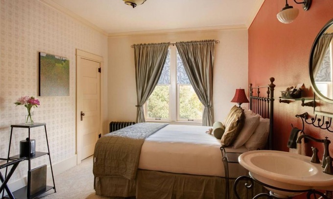 Cody Hotel | Western Charm Awaits in this Cozy Room w/Complimentary Breakfast