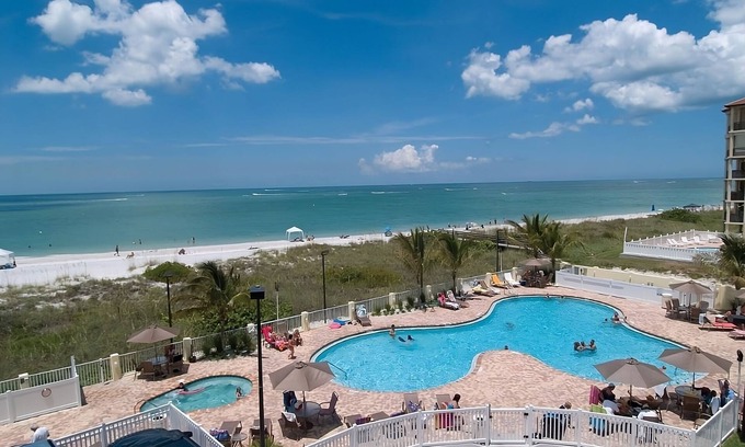 Treasure Island Hotel | Your Home Away From Home! Balcony, Kitchen, 2 Pools, Free Parking