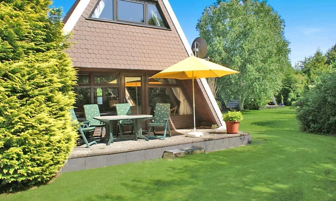 Damp Resort | Zeltdachhaus mit TV im Schlafzimme