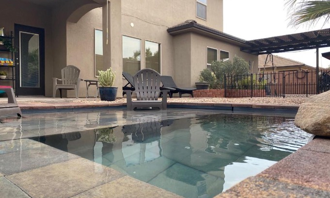St. George House | Zion RV Stone Pool Inn, Pets stay Free, fenced in yard, relaxing waterfall!