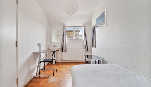 Basic Single Room, Shared Bathroom