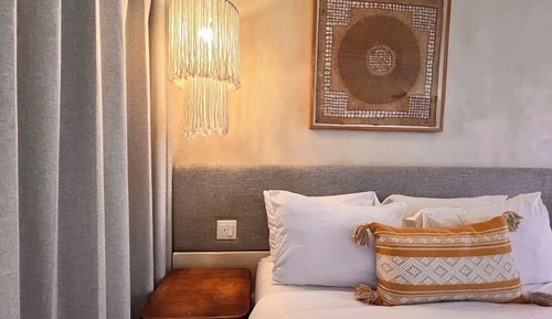 Two Queen Beds with Partial Ocean View