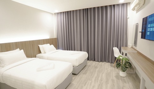 Deluxe Twin Bed With Garden View