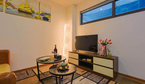 One-Bedroom Apartment with Balcony and City View