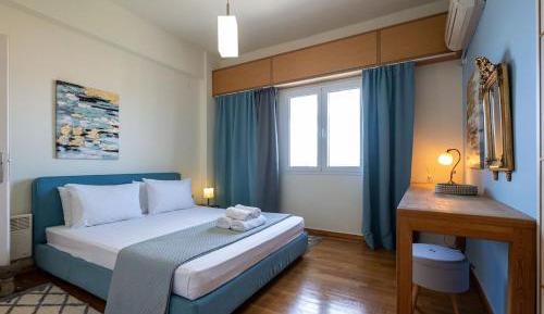 One-Bedroom Apartment with Balcony and City View