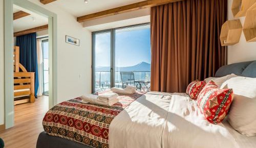 One-Bedroom Apartment with Balcony and Mountain View  