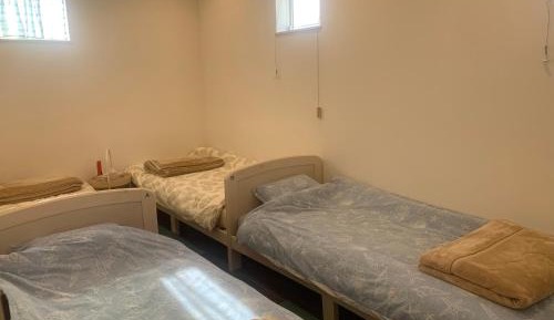 Quadruple Room with Shared Bathroom