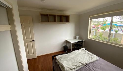 Queen Room with Shared Bathroom