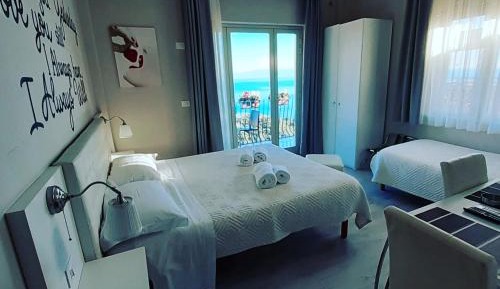Standard Triple Room with Balcony and Sea View