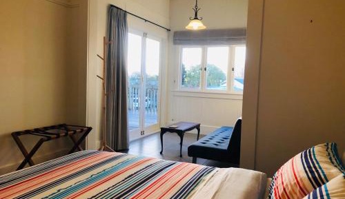 Queen Room with Shared Bathroom