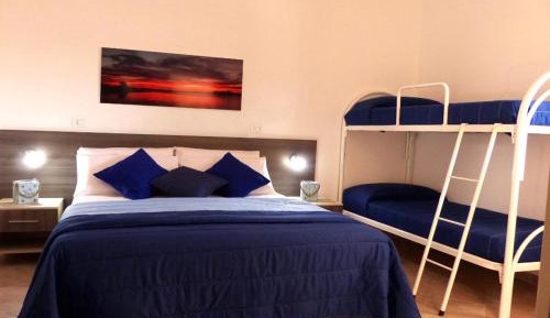 Quadruple Room with Private Bathroom