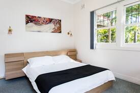 Korora Villa | Stunning Jacaranda villa. Sleeps 14