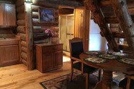 Missoula County House | Log cabin nestled in the mountainsides