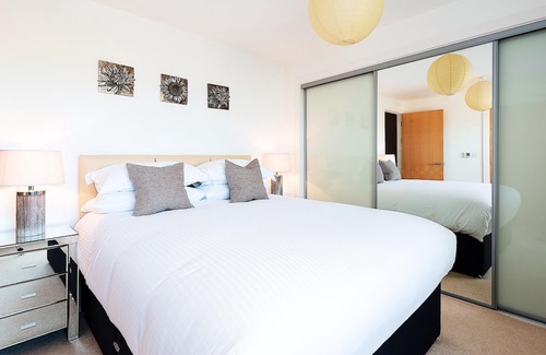 Lusty Glaze Apartment | 2 Bolowthas Court-Spacious apartment close to beaches, parking, coastal and sea views.