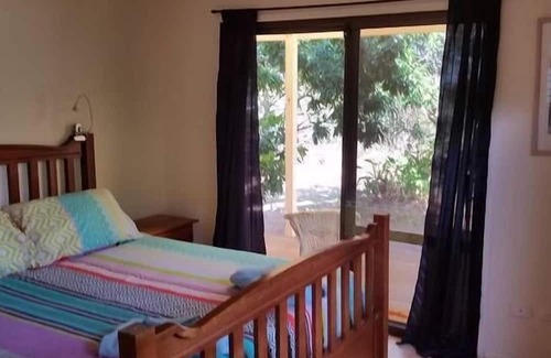 Brisbane Waterfront House | Pet and Family Friendly Peaceful Island W'front home, crabbing, kayaking, bikes