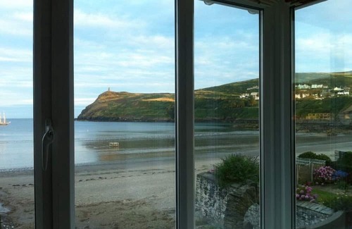 Port Erin Cottage | Beautiful cottage opposite Port Erin bay. Garden above beach. Fabulous sunsets!
