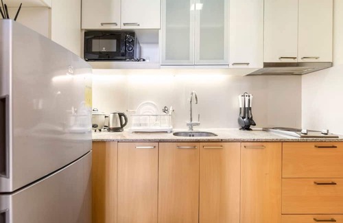 Lapu-Lapu Apartment | Two Furnished 1BRs | Amenity View, WiFi, Netflix, Pool and Beach