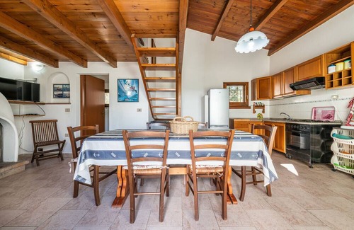 Sant'Antioco Apartment | Apartment 'Ambra One' with Mountain View, Private Garden & Terrace