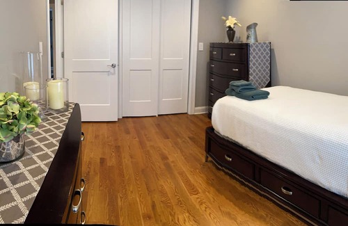 Elmwood Park Apartment | Modern Beauty- 3BR/2BA Apt. 10 miles from NYC. Natural Gas Grill & Fire Pit.