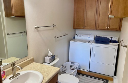 Juneau Apartment | Sunny apartment near a lake, great walking trails, and a playground on site.