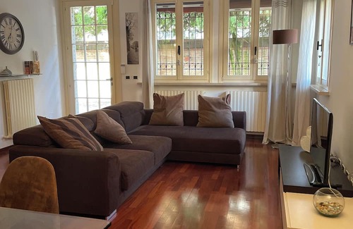 Ferrara Apartment | Elegant flat 5 min from the centre of Ferrara, with private garden and parking.