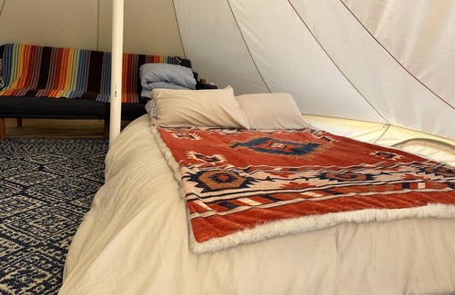 Alpine RV Rental | Stunning glamp tent with wifi, bathrooms, showers, 20 acres under cover!