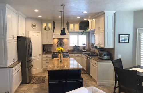 St. George House | Rent Our Pool and Pickleball Court, and Stay in Our House for Free!