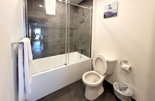Fabreville Apartment | Corporate Stays - Elegant 3BR with Rooftop, Gym & Lounge