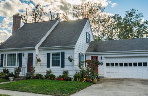 Pawtuxet Village Historic District House | A Curated Cape on the Cove....walk to shops and restaurants in seaside village.