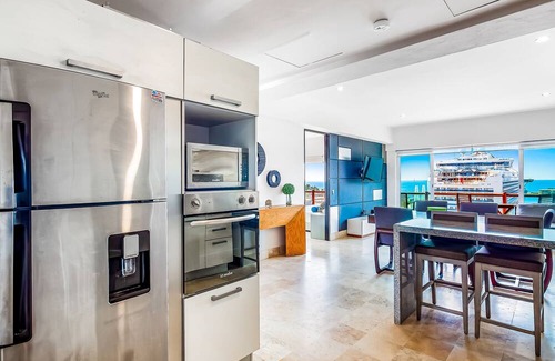 Palmar de Aramara Condo | 8th-floor ocean-view condo with balcony, outdoor pool, gym, washer/dryer, & AC