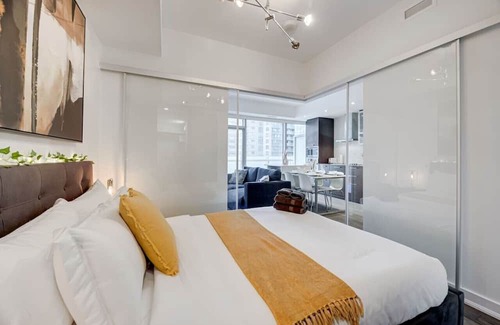 Central Waterfront Apartment | Perfect Downtown Stay: Steps from CN Tower & Arena