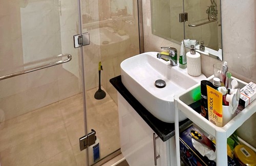 Doha Apartment | Heart of Doha Elegant Home with Shared Swimming Pool
