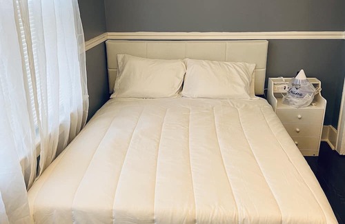 Irvington House | Four Single Bedrooms with hard wood floors.