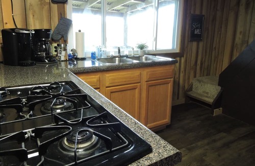 Malaga Cabin | Gotta Getaway Cabin 2 full beds with queen sleeper sofa