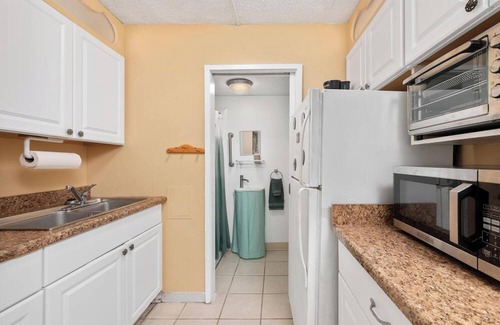 Historic Kailua Village Hotel | Studio Condo in town and across from the Ocean with a Pool