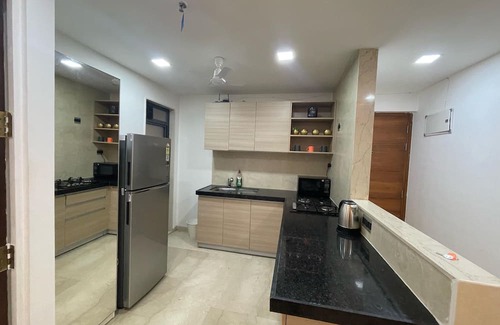 Kurla Apartment | Business-Ready Apt near Jio World Centre | 1BR + Gym + Pool