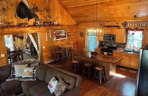Abbot Cabin | Relaxing in the peaceful woods of Northern Maine is the goal here at the Lodge